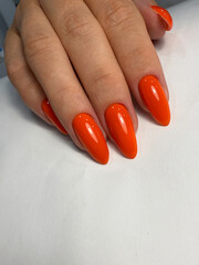 Orange gel nail polish