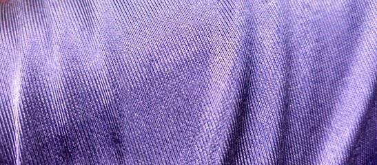 Vibrant Purple Fabric with Ribbed Texture and Folds