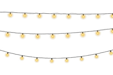 Twinkling fairy lights glow in soft amber. Golden garland loops around festive corner. Warm bulbs dangle on celebration wire. Holiday sparkle brightens the dark scene. © Felicety