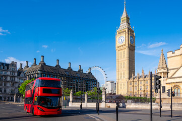 Big Ben with typical red bus in London, England, UK