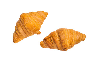 Freshly baked French croissant isolated on white background, top view.