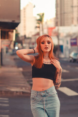 young woman walking on the street in the city