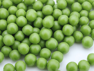 Fresh green peas piled up for cooking purposes