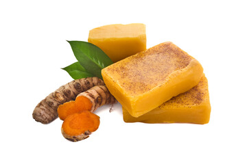 Turmeric Soap. Yellow turmeric soap bars with fresh turmeric roots on a white background.