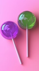 Colorful lollipops on a pink background create a cheerful and sweet atmosphere