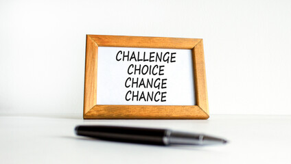 Challenge choice change chance symbol. Concept words Challenge choice change chance on wooden picture frame. Beautiful white background. Business Challenge choice change chance concept. Copy space.