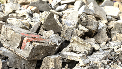 Pile of concrete and brick rubble creating textured debris