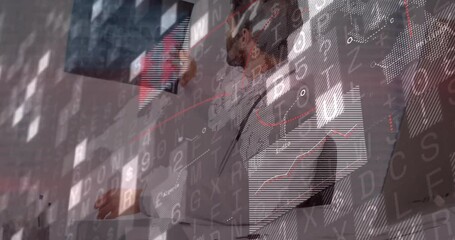 Doctor reviewing patient documents, lifting, rotating X-ray film toward light for medical diagnosis - Powered by Adobe