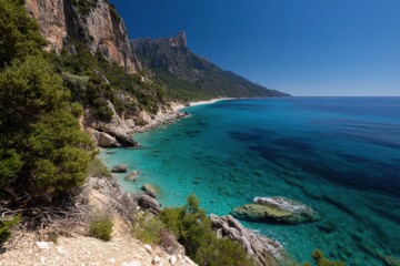 Cala luna breathtaking turquoise sea and coastal scenery along the gulf of orosei hiking trail in sardinia, italy. Ideal imagery for travel aficionados and nature lovers