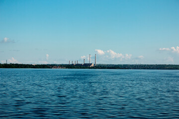Panoramic view of the Pridneprovskaya TPP in the city of Dnepr. Ukraine. Reflection of the sky with...
