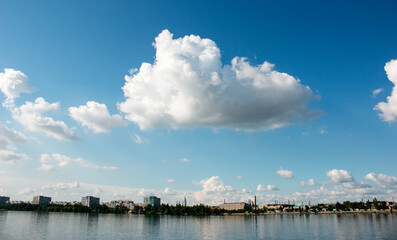 Panoramic view of the left bank of the Dnieper River. Dnieper. Ukraine. Reflection of the sky with...