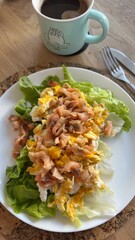 Well-balanced breakfast featuring healthy source of ptotein, fermented and fresh vegetables, salad and nuts on a plate. Top view real kitchen photo, diet and self care and love concept	
