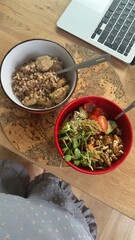 Well-balanced breakfast featuring healthy source of ptotein, fermented and fresh vegetables, salad and nuts on a plate. Top view real kitchen photo, diet and self care and love concept