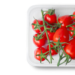 Top view of fresh cherry tomatoes on the vine in a plastic container
