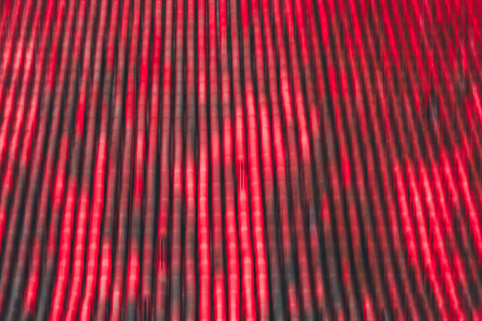 Abstract Red Vertical Light Streaks Background