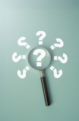 Curiosity drives the search for clarity as focus sharpens on key questions under a magnifying glass