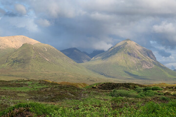 Fototapeta premium The rising mountains of Meall Odhar Beag, and Meall Odhar Mor, part of the Cuillin range, Isle of Skye, Scotland, UK.