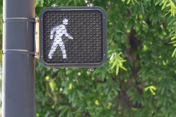 Illuminated led white lights person walk crosswalk sign signal with copy space