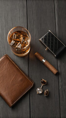Dark Chic Flatlay for Bachelor Party with Whiskey and Cigar Elements
