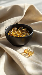 Luxury Softgel Capsules in Black Dish with Light Linen Backdrop
