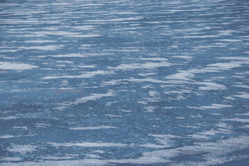 Vector illustration of Winter nature background with blocks of ice on frozen water in spring. Abstract background of drifting ice on water. 
