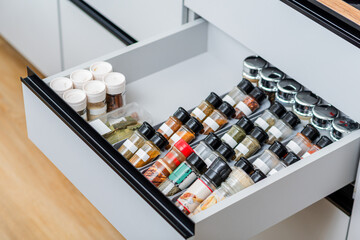 Organized Spice Rack in a Kitchen Drawer