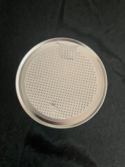 Metal lid on peanuts