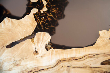 Live edge burl wood with black epoxy resin river
