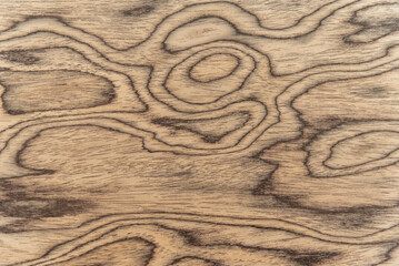Walnut veneer surface with soft grain wood texture