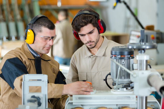 two workers in workshop