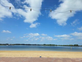 Sea view of the coast of the Netherlands (Rotterdam). Sea beach. Sea waves on sand beach. Panoramic...