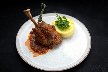 Roasted lamb leg with mashed potatoes