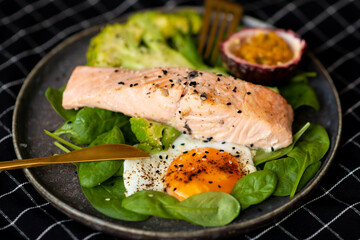 Baked or fried salmon and salad, Paleo, keto, fodmap, dash diet. Mediterranean food with steamed fish.