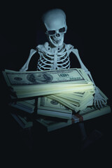 Conceptual photo: negative impact of gadgets on a child. A little girl plays games on a laptop,...
