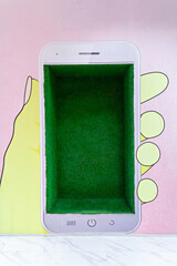 Creative phone-shaped box designed for fun storage in vibrant colors and playful art
