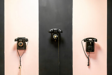 Vintage telephones adorn a  wall in a retro  bringing back memories of an era gone