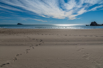 View of the Mediterranean Sea from Cala de Finestrat beach, with Benidorm Island in the background,...