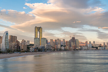 Sunset view of modern buildings in front of Poniente Beach in Benidorm, Spain