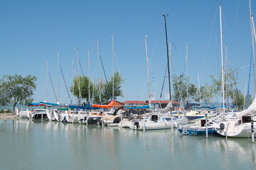 Obraz premium yacht club with boats and yachts on Lake Balaton in Hungary. Yachts moored in a marina on the lake
