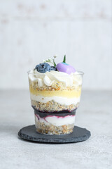 Trifle with poppy seed sponge cake, blueberry filling, lemon curd.
