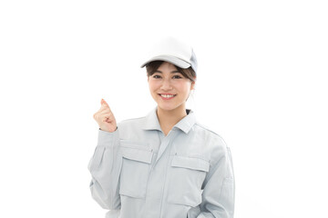 若い女性　作業着　ガッツポーズ
