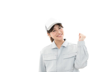 若い女性　作業着　ガッツポーズ
