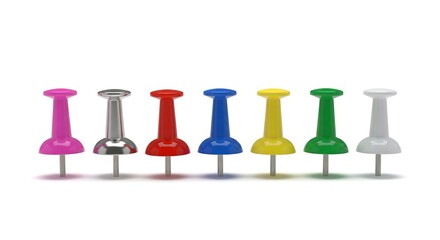 Row of colorful push pins. Seven pins with pink, silver, red, blue, yellow, green, and white heads stand in a line against a white background.