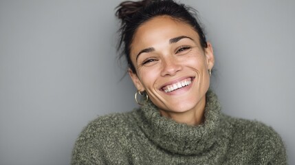 A woman with a green sweater