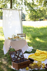 Summer picnic in white and yellow style with lemons