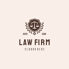 Law firm  with scales of justice emblem.