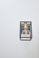 Modern Black Metal Wall Light Fixtures in Contemporary Bathroom
