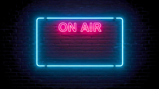 A glowing neon sign displaying "ON AIR" in pink letters within a rectangular blue border, set against a dark brick wall background.