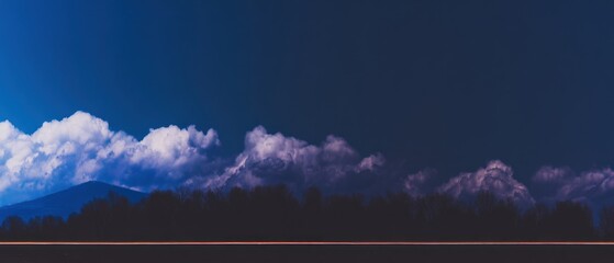 Dramatic twilight sky over a mountain range