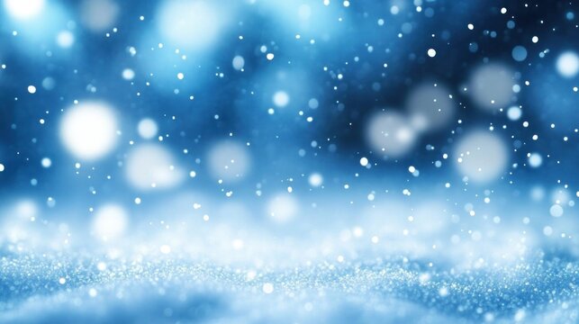 Close-up of soft glowing white particles floating over a blurry blue background creating a magical, serene, wintery atmosphere
